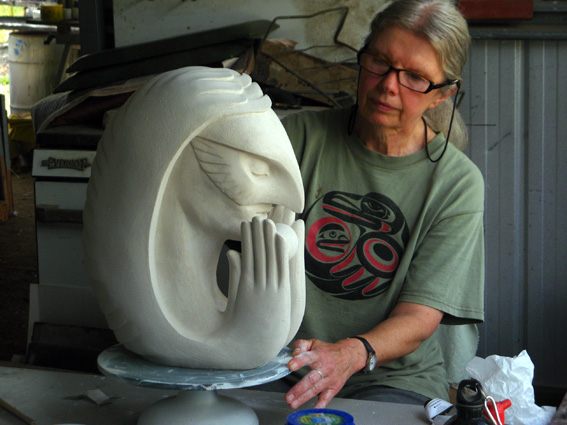 Joan Relke with First Word Ceramic Sculpture