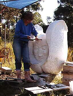 Joan Relke with Last Sound marble sculpture